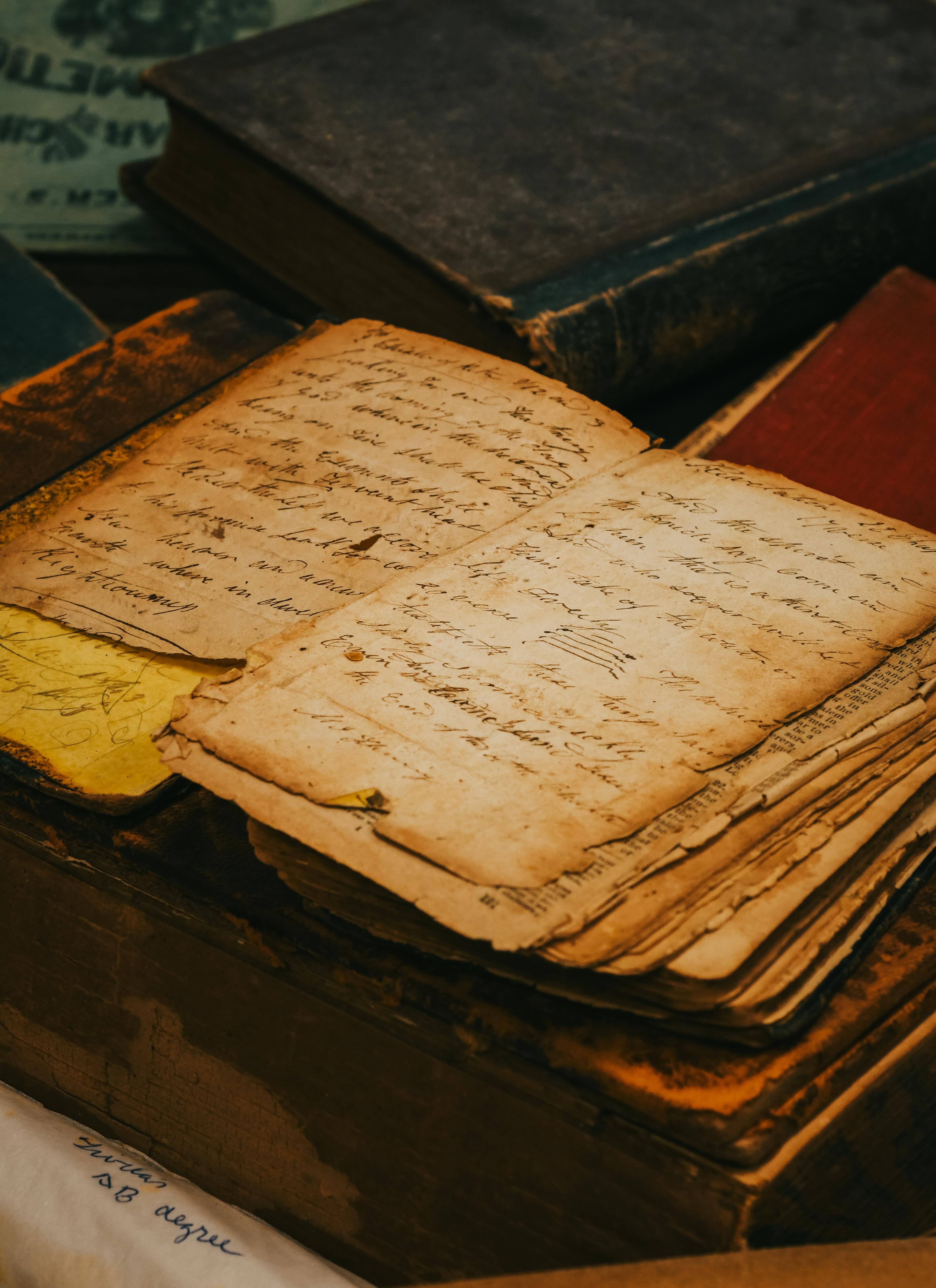 Old paper with cursive writing on a vintage desk, capturing a timeless historical essence.